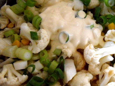 Step 3 - Add cauliflower, sweetcorn and springonion and let simmer for 10 minutes