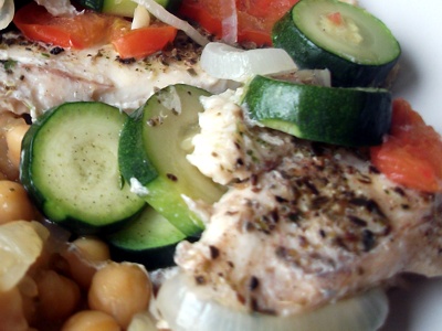 fish fillet with zucchini and tomatoes