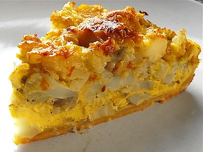 The mild flavour of the cauliflower quiche recipe is spiced up with the flavours of curry, ginger and nutmeg.
