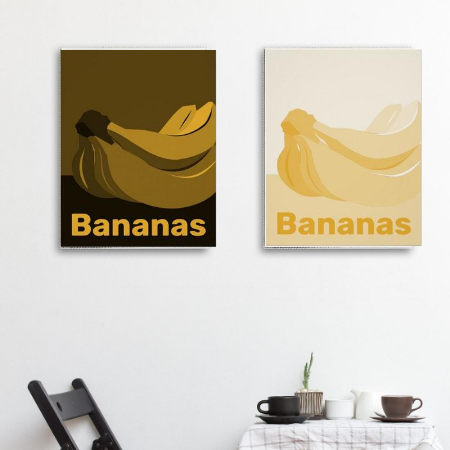 a black and white dining area showing as wall decor monochrome canvas prints in hues of yellow with bananas