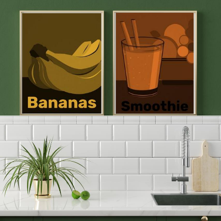 a white and green kitchen wall decor with poster prints, showing banana wall art and a modern fruit art print with a smoothie tumbler